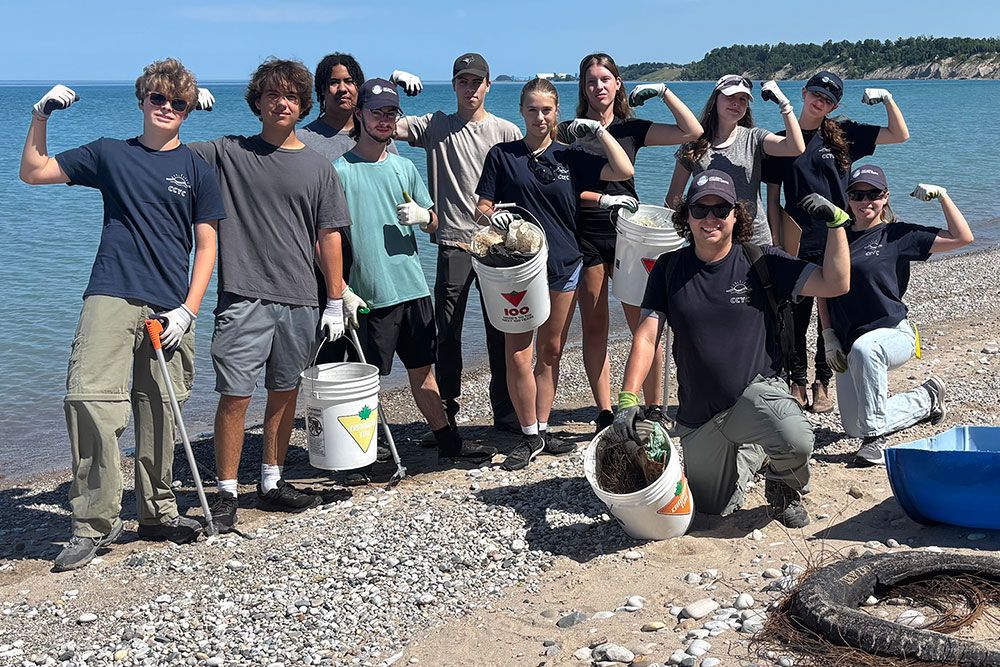 Helping to keep Lake Huron clean, Coastal Conservation Youth Corps members.